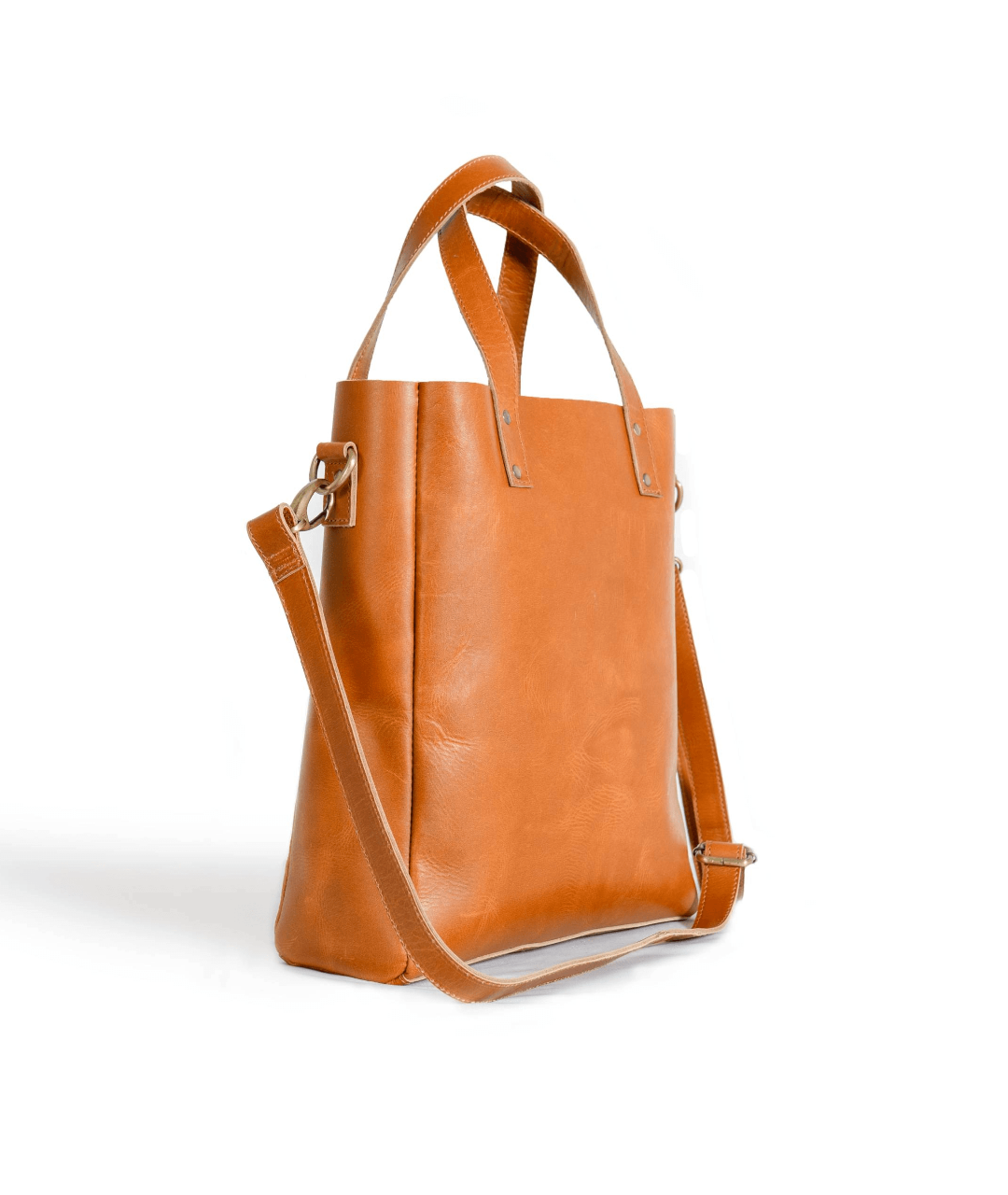 Classic tan leather tote bag with spacious interior and elegant design