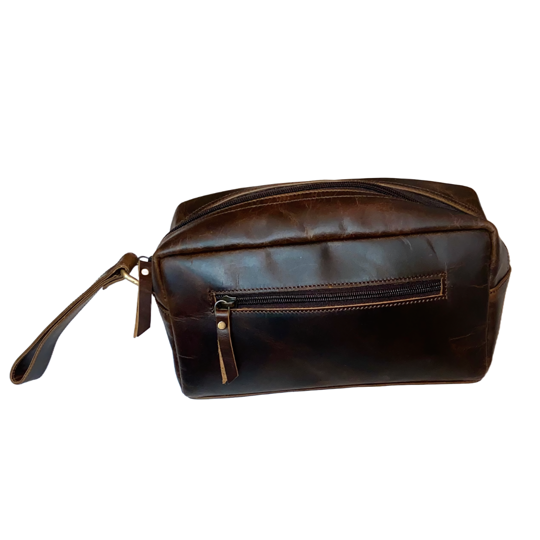 Elegant leather toiletry bag with multiple compartments, perfect for organizing your essentials on the go