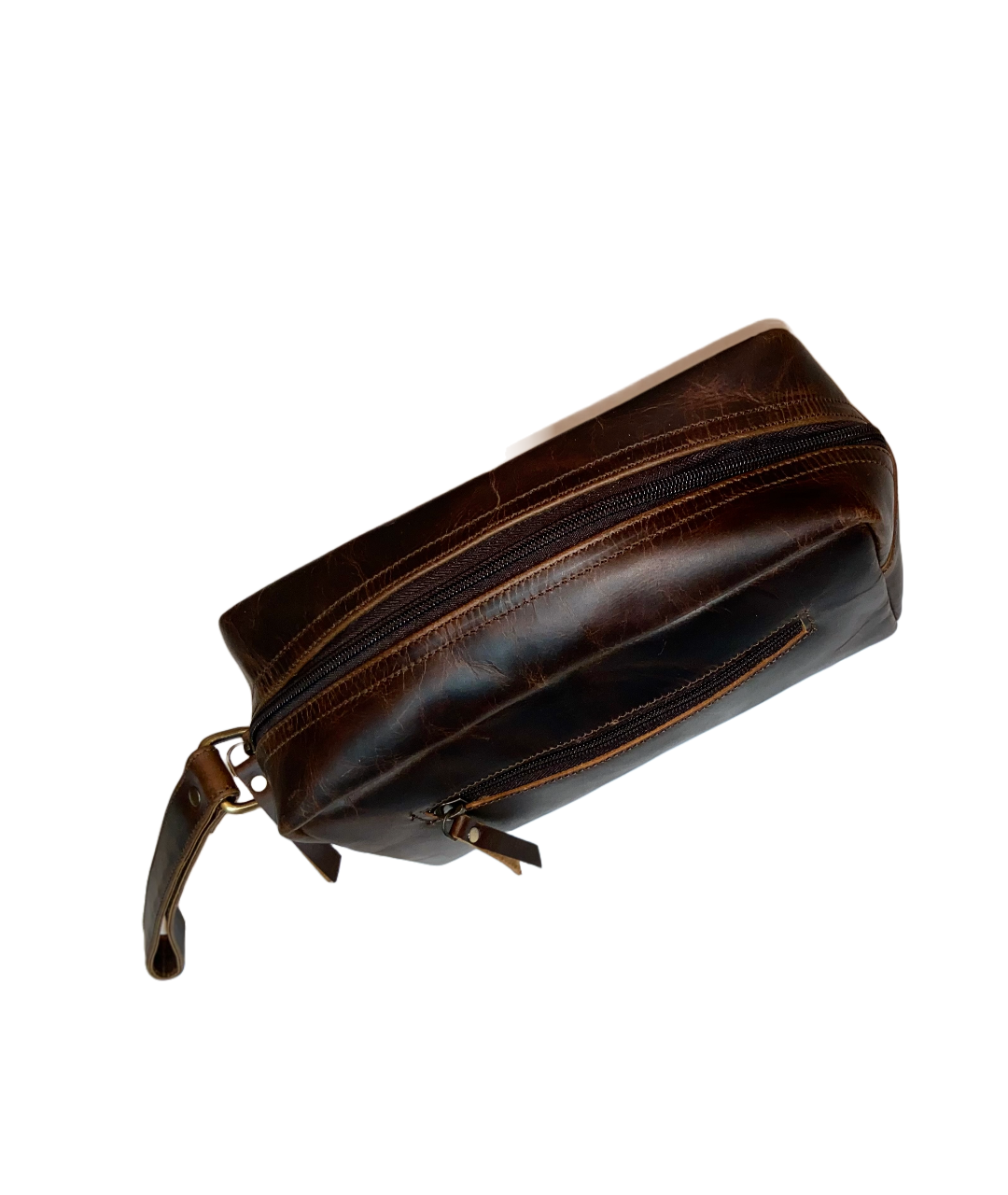 High-quality leather toiletry bag from Nera Exim with multiple compartments, perfect for organizing travel essentials