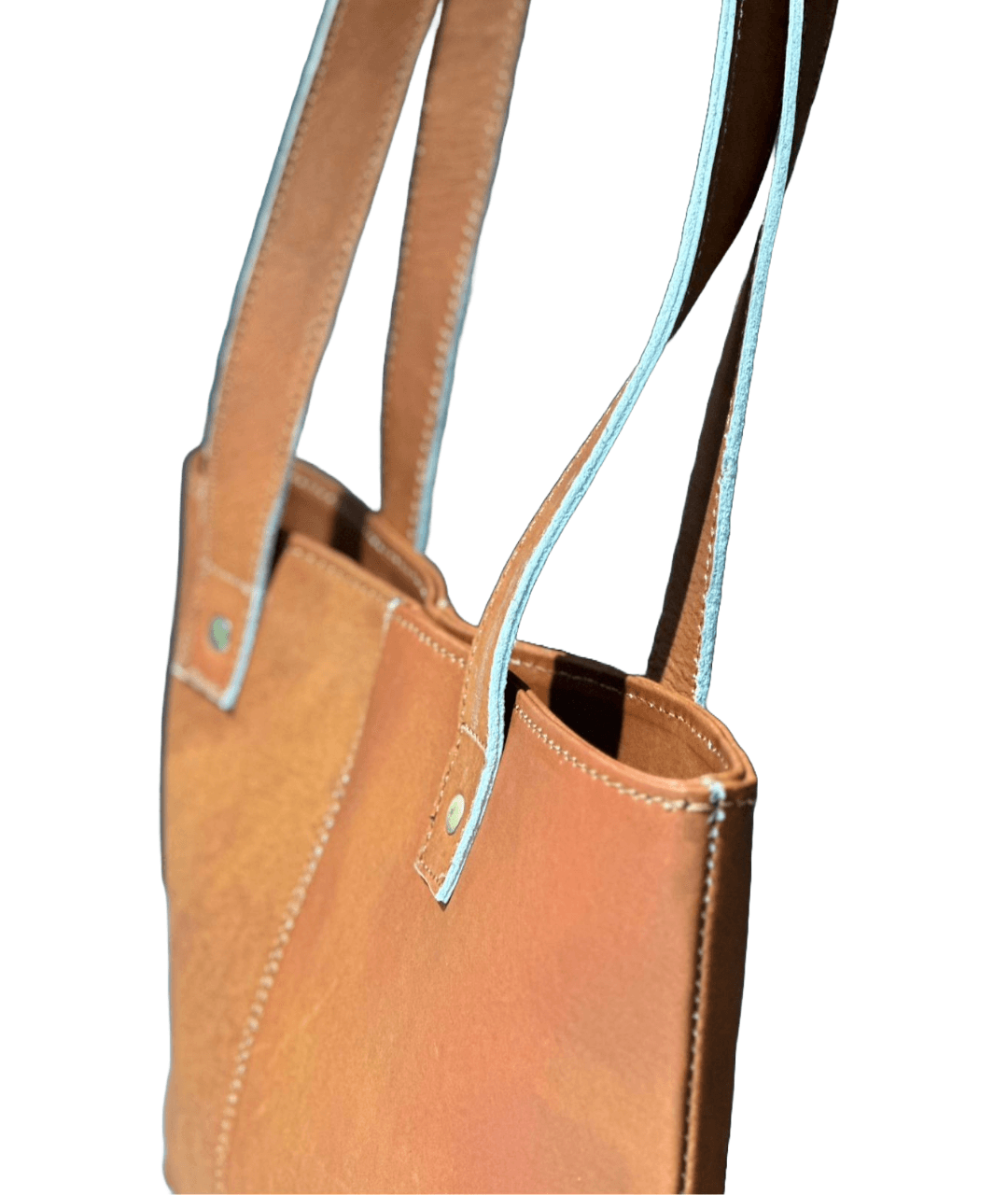 Buy Online Premium brown leather tote bag perfect for everyday use, featuring durable handles - Neraexim leather handbag